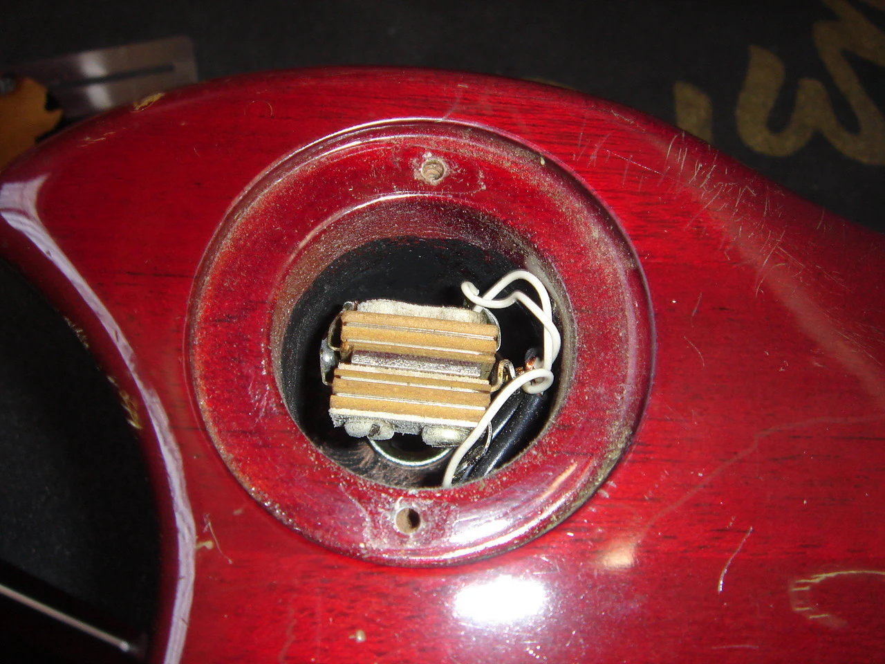 Output jack assembly viewed through the rear cavity